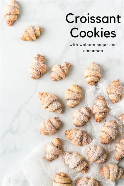 These adorable mini croissant cookies or better known as Rugelach or Rogaliki are rolled in a ...