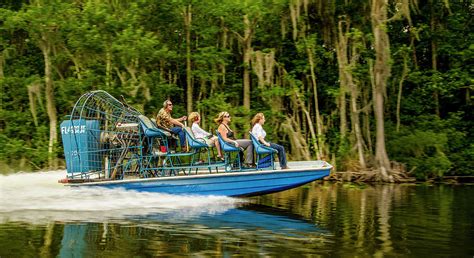 Airboat tour in swamp Photograph by Steve Williams - Pixels