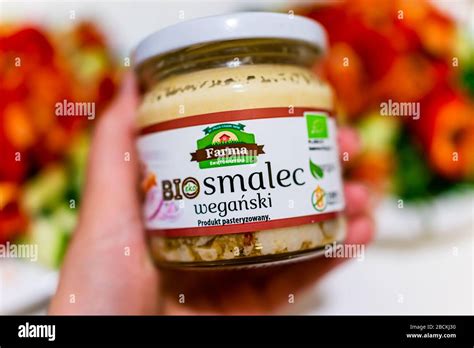 Warsaw, Poland - January 22, 2020: Hand holding organic vegan food product called smalec, pork ...