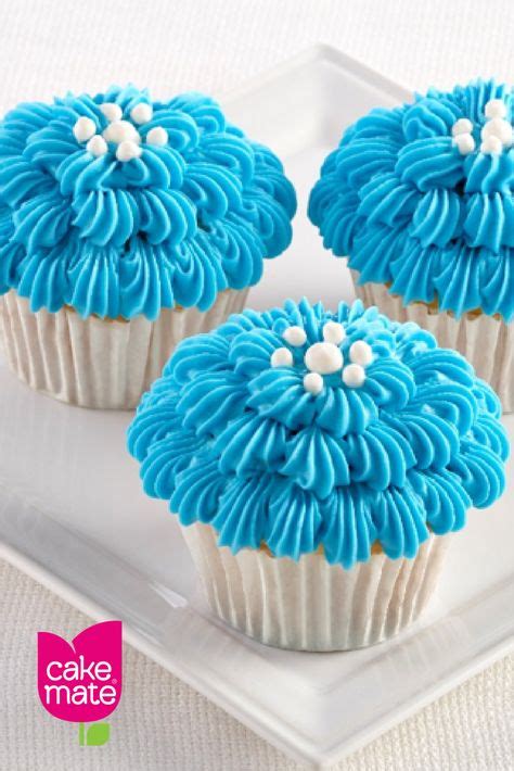 These pretty blue cupcakes are perfect for your next baby boy shower! Made with Cake Mate® Icing ...
