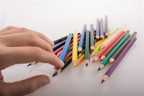 Hand holding pencils 14792879 Stock Photo at Vecteezy