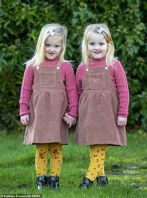 Four-year-old 'mirror-image' twins do everything in precisely opposite ...