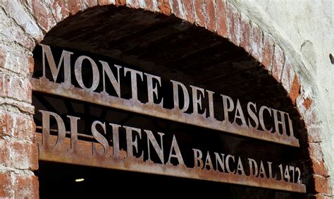 Monte dei Paschi cuts legal claims to 4.9 bln euros - slide | Reuters