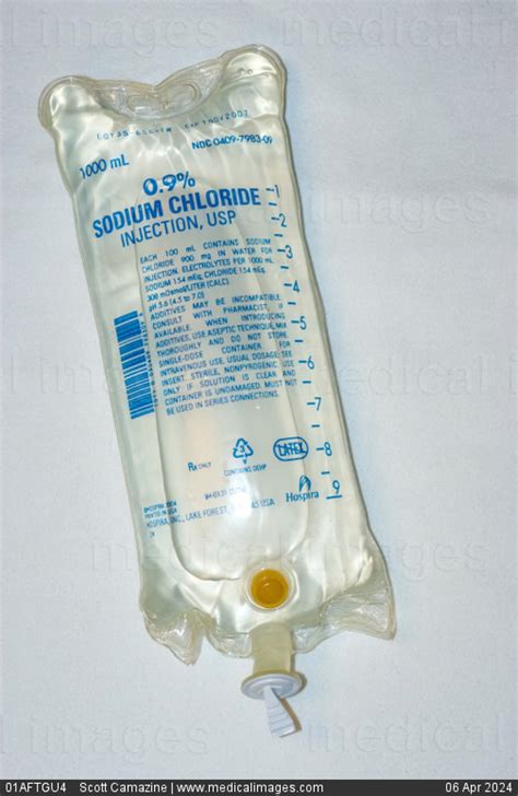 STOCK IMAGE, intravenous iv bag containing one liter 1000 ml of 09 normal saline sodium chloride ...