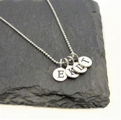 personalised silver initial letter charm pendant