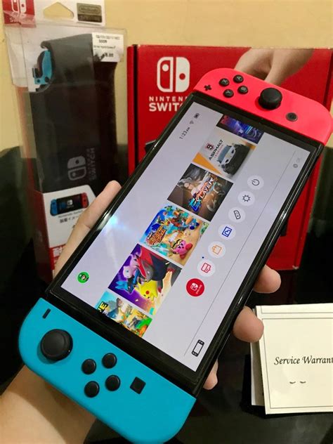 Nintendo switch Oled with games, Video Gaming, Video Game Consoles, Nintendo on Carousell