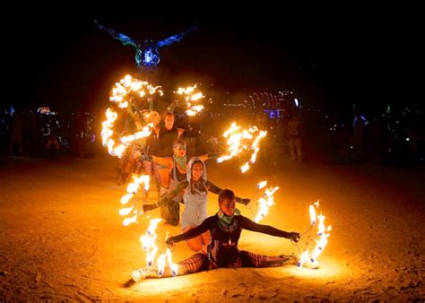 Photographer at This Year's Burning Man Captures Rain, Mud, and Love ...