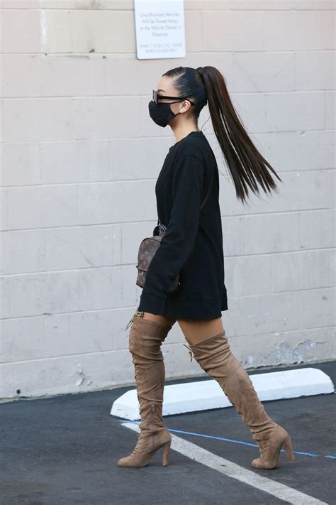 Ariana Grande in a Black Dress and Knee Beige Boots - Beverly Hills 11/14/2020 • CelebMafia