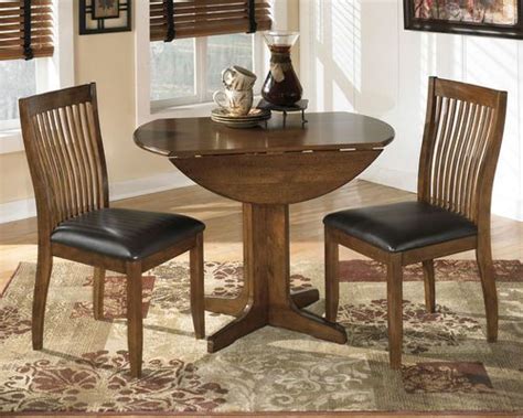 Stuman Medium Brown 3 Pc. Round Drop Leaf Table & 2 Upholstered Side Chairs | Small dining table ...