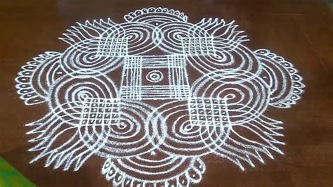 A Beautiful Padi Kolam. A Traditional Padi Kolam. Padi Kolam with Dots ...