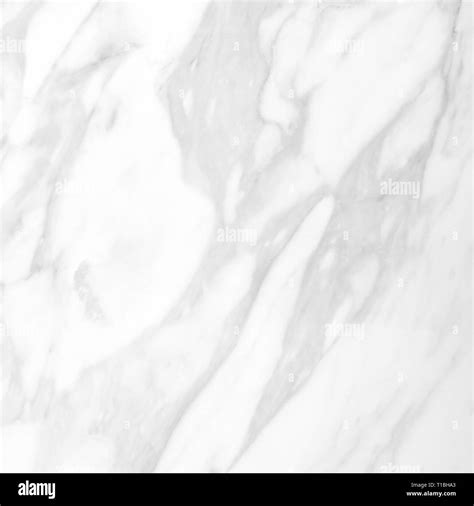 Marble texture on white marbled tile, closeup photo on marbled tile surface on marbled floor ...