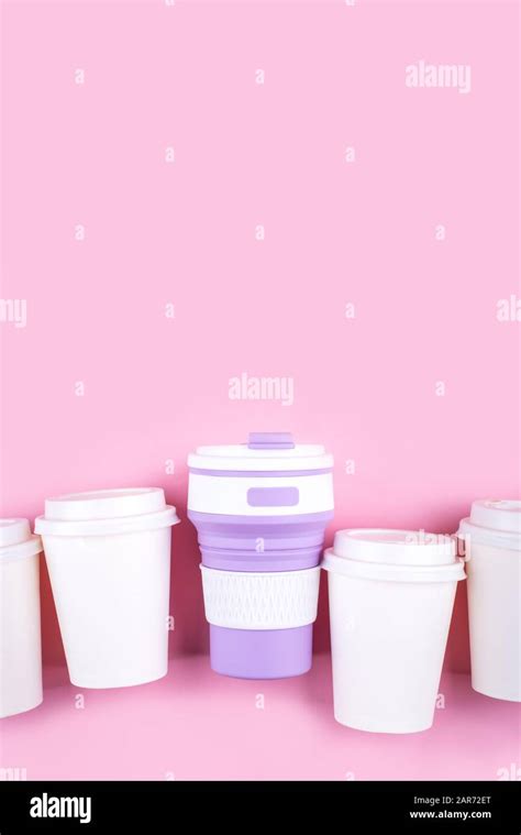 Reusable coffee cup vs disposable cups Stock Photo - Alamy