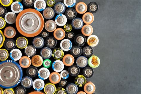 Close Up of Positive Ends of Discharged Batteries, Selective Focus, Macro Photo. Used Alkaline ...