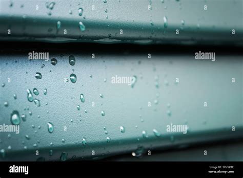 Macro of raindrops on the shutter, detail Stock Photo - Alamy