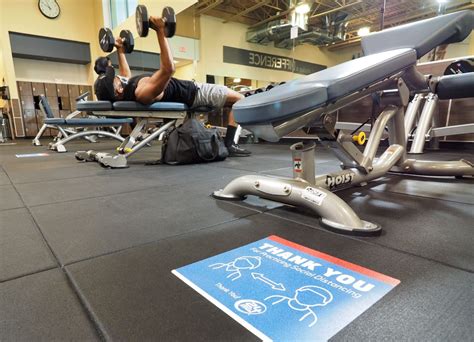 Inside an N.J gym on reopening day. Temp checks, masks and reserved ...