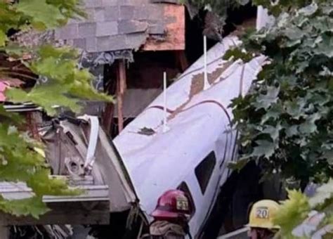 Horrifying moment plane is seen spiralling mid-air in Oregon before crashing into a house ...