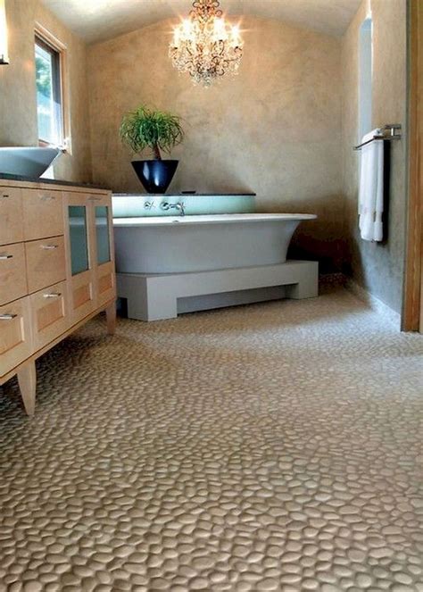 Modern Bathrooms with Pebble Tile Floors | Shower floor tile, Pebble ...