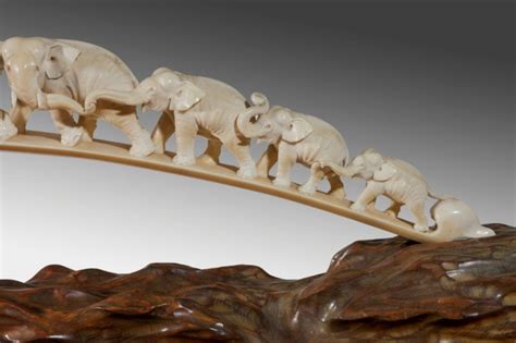 A Japanese ivory tusk carving of a group of elephants | Wick Antiques