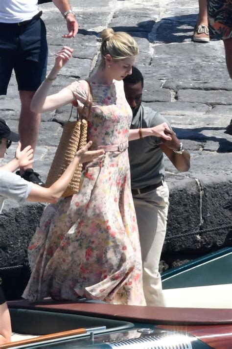 Can someone help me find the dress (or something similar) Elizabeth Debicki wears in Tenet? Also ...