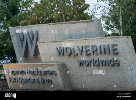 A logo sign outside of the headquarters of Wolverine Worldwide in ...