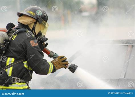 Firefighter in action editorial stock image. Image of uniformfirst ...