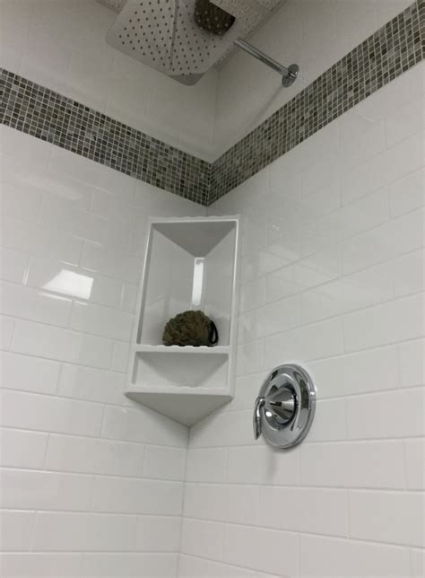 Shower wall panel installation problems solved with custom trim, windows and niches