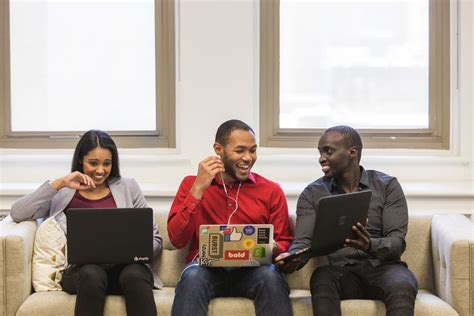 Free Stock Photo of Laughing Friends On Couch — HD Images