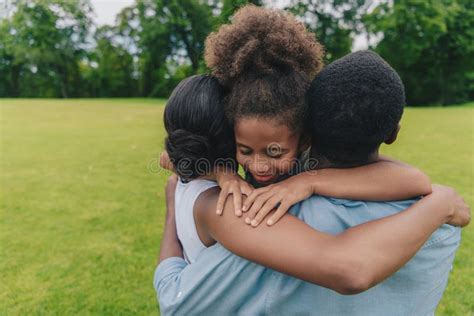 Family Hugging Each Other