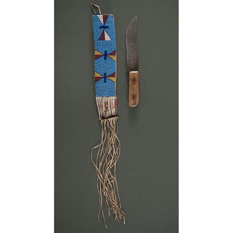 Northern Plains Beaded Hide Knife Sheath with Knife | Cowan's Auction House | Hidden knives ...