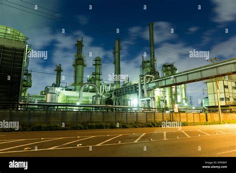 Industrial building at night Stock Photo - Alamy