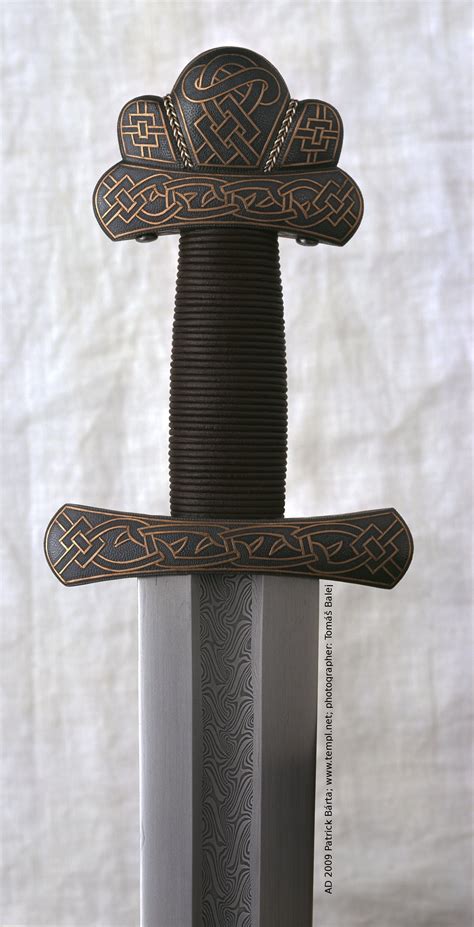 Viking sword hilt from cooper inlay iron, pattern-welded blade. 8th Century. Gjermundbu, Norway ...