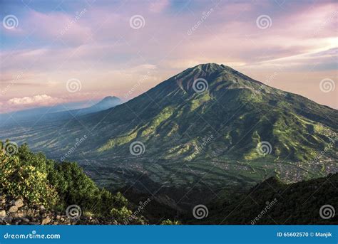 Merbabu volcano in Java stock photo. Image of crater - 65602570