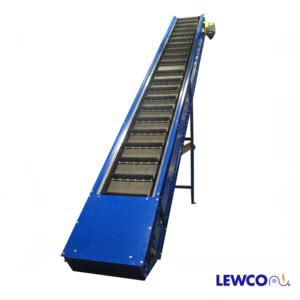 Heavy Duty Cleated Roller Bed Belt Conveyor – Lewco Conveyors