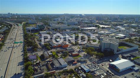 an aerial view of a city with lots of buildings and streets in the ...