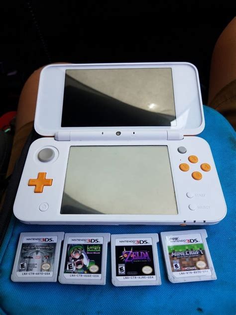 Nintendo 2DS XL orange with 4 games | Nintendo 2ds, Nintendo, Gaming products