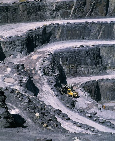 Terraces of Penrhyn slate quarry with dumper truck - Stock Image - T850/0059 - Science Photo Library