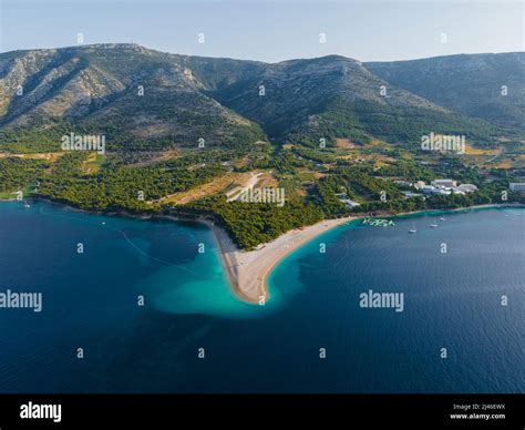 Aerial view of Zlatni rat beach on Adriatic sea, Bol, Brac island, Croatia. Summer vacation ...