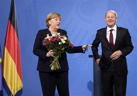 Scholz replaces Merkel as German chancellor, opening new era | AP News