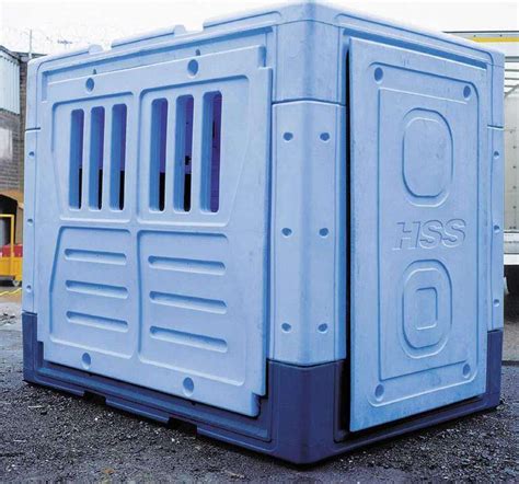 a large blue container sitting in the middle of a parking lot