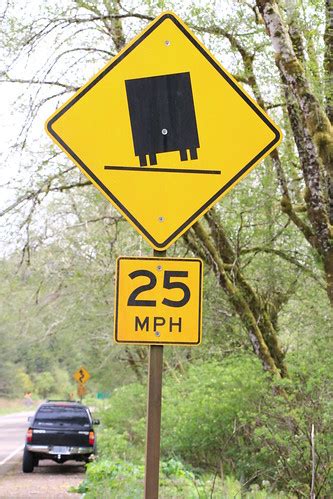 IMG_4630 | Car parked near curve warning sign | Oregon Department of Transportation | Flickr