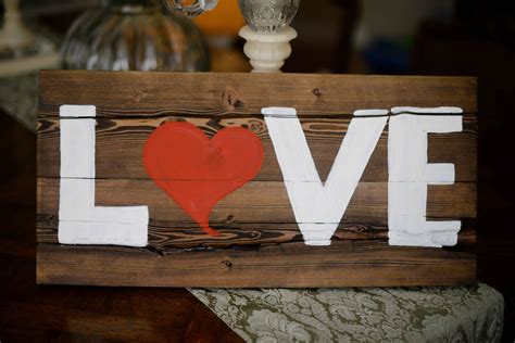 This wooden love sign is perfect for your home, wedding decoration, babies room or to give as a ...