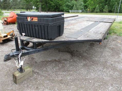 Tandem axle trailer, heavy duty with 14" wheels, 2" ball hitch, 8 1/2'W x 22'L, has a loading ...