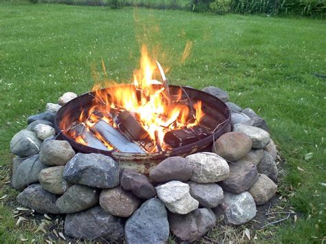 firepit with rock surround | Outdoor projects, Fire pit