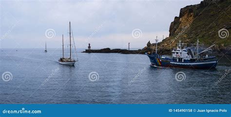 Motorboat and Sailboat, Fishing Boat on the Coast of the Cantabrian Sea ...