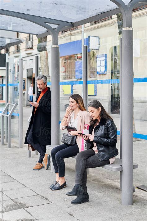 People Waiting At A Bus Stop by Ivan Gener - Bus Stop, Commute | Bus ...