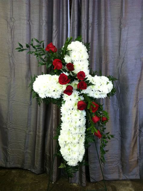 "Bleeding Heart" standing spray made with with white daisies and red ...