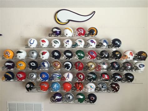 Man cave wall. These are the mini helmets--5 inches tall. Initial goal ...