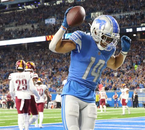 Lions WR Amon-Ra St. Brown exits with concussion - National Football Post