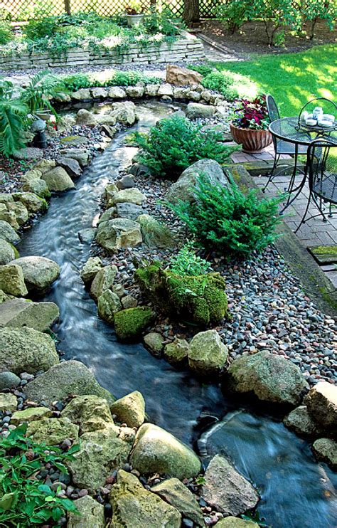 Backyard rock and stream landscaping • photo: The Green Living Expert | Water features in the ...