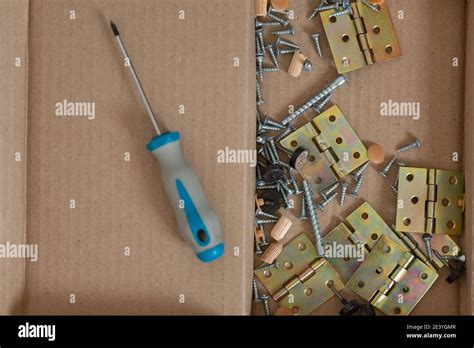 Wood screws and fasteners for wood furniture Stock Photo - Alamy